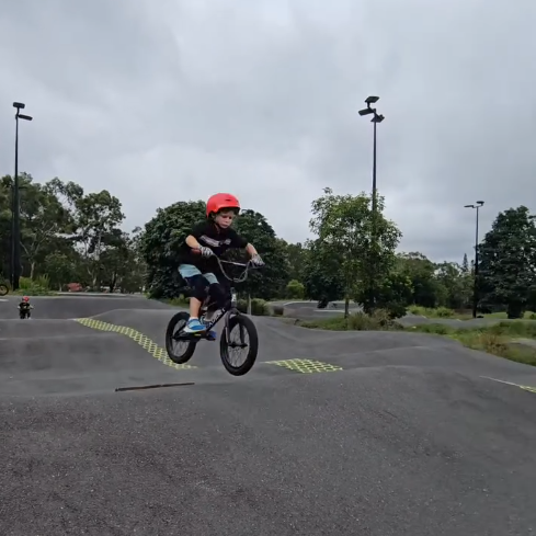 Young BMX rider at Darra Pump Track during Stylecat Coaching